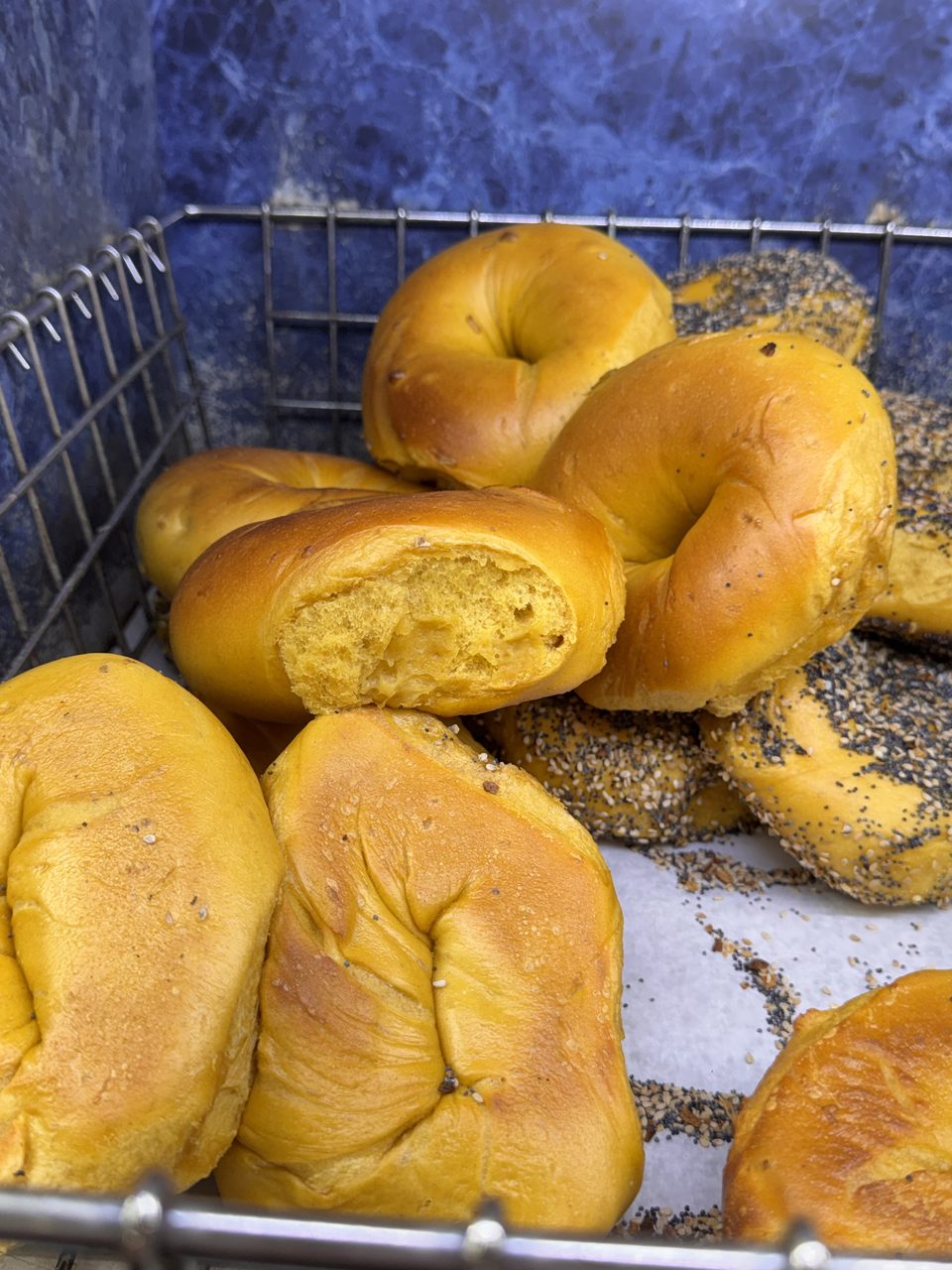 Hand-rolled everything and poppy bagels in the basket