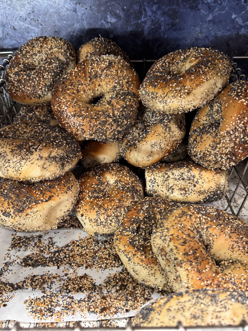 Egg bagels and seeded bagels in the baskets