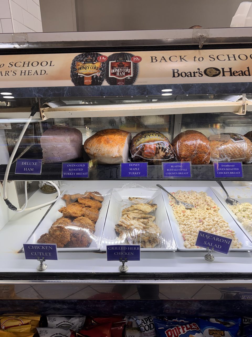 Boar's Head ham and turkey, chicken cutlets, grilled chicken and macaroni salad