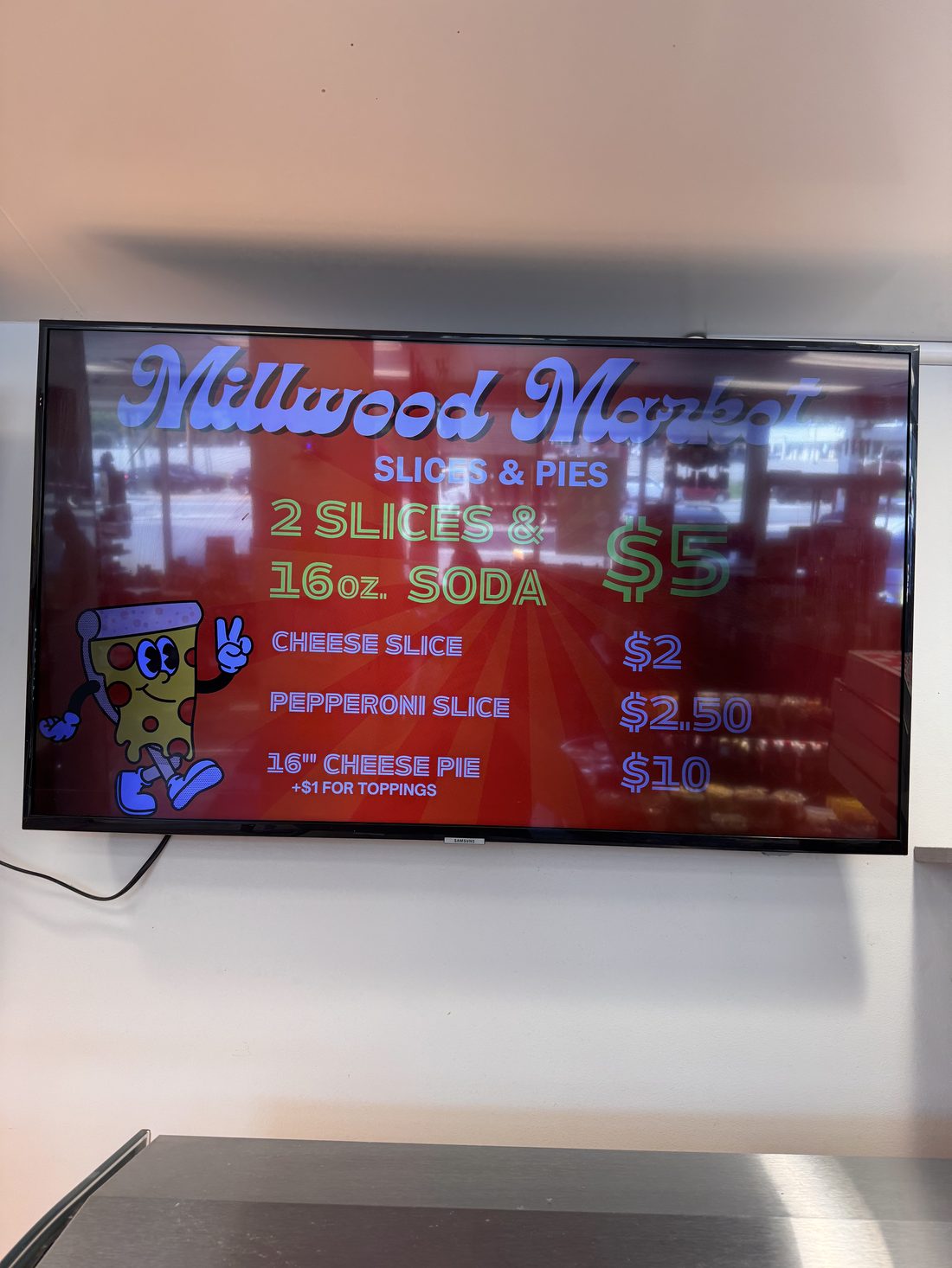Pizza menu board — house-made slices and pies